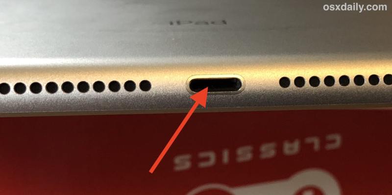 检查 iPad 上的端口阻塞，它可以防止充电