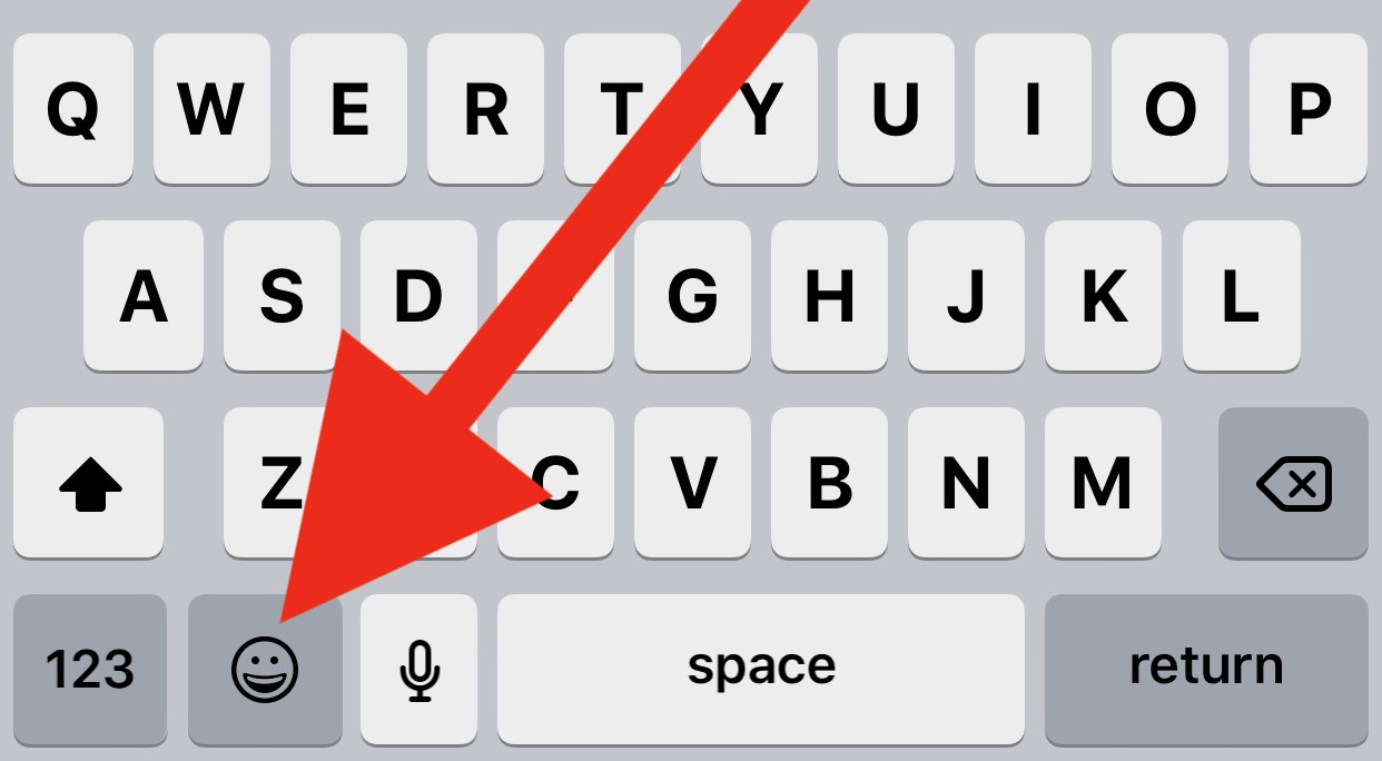 iPhone 或 iPad 键盘上的表情符号按钮