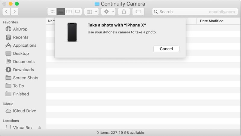 使用 iPhone 或 iPad 拍摄照片Mac 上的连续性相机
