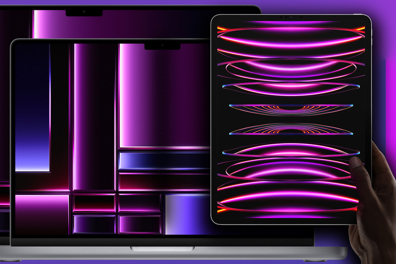 MacBook Pro 搭配 iPad Pro，壁纸为紫色